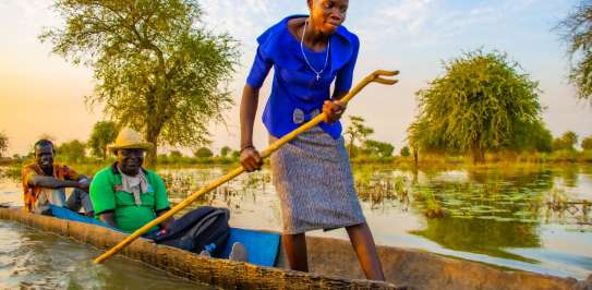 A woman in South Sudan canoeing