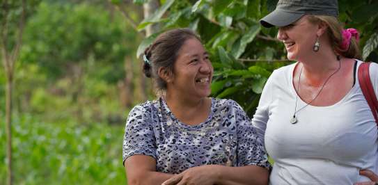 Emma Donlon speaks with local woman, Esther, in the Amazon rainforest