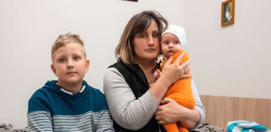 Natalia and her two children are the first family to stay in a shelter supported by HIA