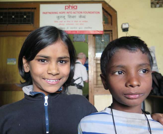 Charisma, 10, and her friend at the Bridge school run by Christian Aid partner, Phia, in Bhowpur, India.