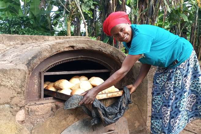 Woman bakes bread in Eastern Congo