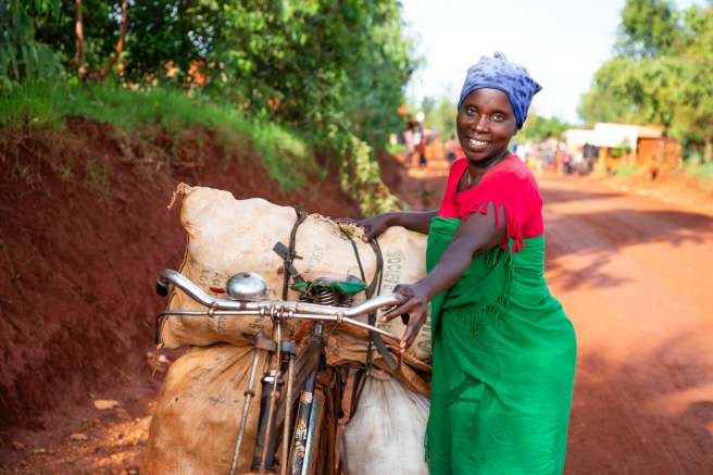 Woman and bicycle in Burundi
