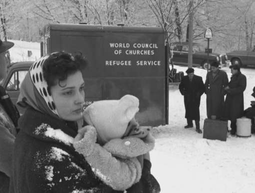 Refugee woman holding baby