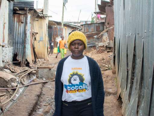Bella pictured in Kibera slum where she lives.