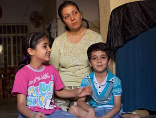 Laman and her children, who fled to northern Iraq to escape bombings in their home town of Aleppo, Syria