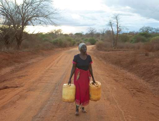 Rose Jonathan, a grandmother from Kenya who must walk miles each day in times of drought to fetch water for her family.