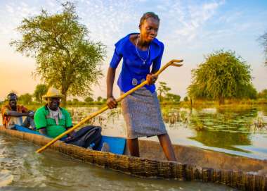 A woman in South Sudan canoeing